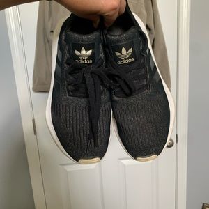Gold and black, sparkly adidas.